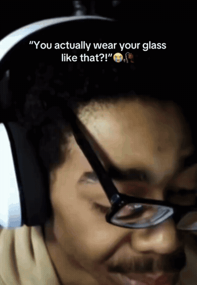 A Man Wearing Glasses And Headphones Says " You Actually Wear Your Glass Like That " GIF