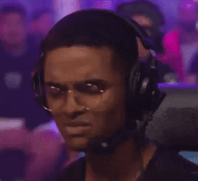 A Man Wearing Glasses And Headphones With A Microphone . GIF