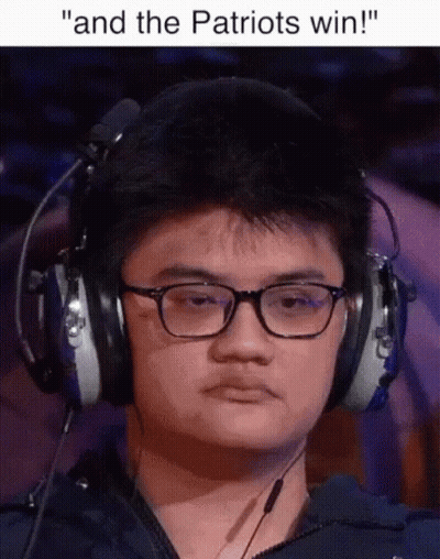 A Man Wearing Glasses And Headphones With The Caption " And The Patriots Win ! " GIF