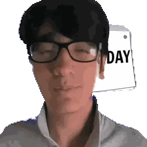 A Man Wearing Glasses Has A Sign On His Head That Says " Day " Sticker