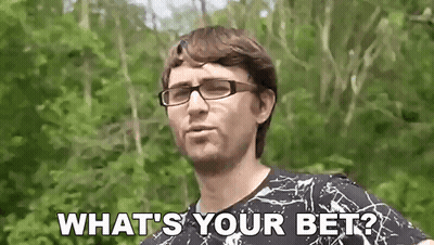 A Man Wearing Glasses Is Asking What 'S Your Bet While Standing In Front Of Trees . GIF