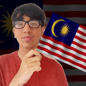 A Man Wearing Glasses Is Holding A Flag With A Crescent Moon And Star On It GIF