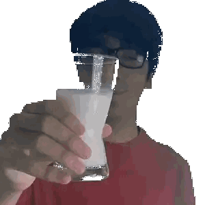 A Man Wearing Glasses Is Holding A Glass Of Milk In His Hand Sticker