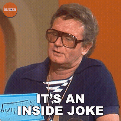 A Man Wearing Glasses Is Holding A Sign That Says It 'S An Inside Joke GIF