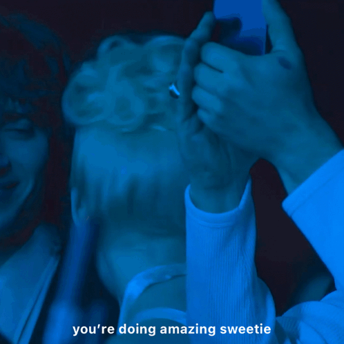 A Man Wearing Glasses Is Laughing With The Words You 'Re Doing Amazing Sweetie Behind Him GIF