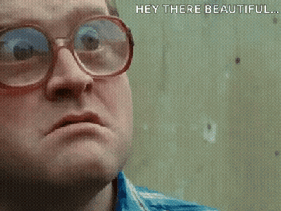 A Man Wearing Glasses Is Making A Funny Face . GIF