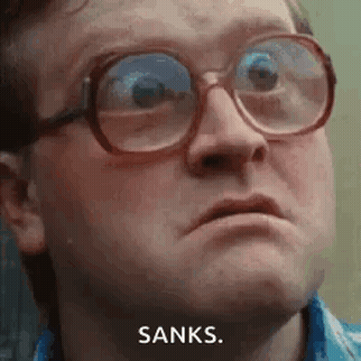 A Man Wearing Glasses Is Making A Funny Face And Saying `` Sanks '' . GIF