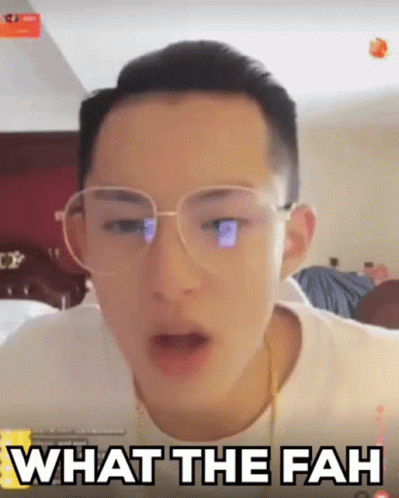 A Man Wearing Glasses Is Making A Funny Face And Says What The Fah GIF