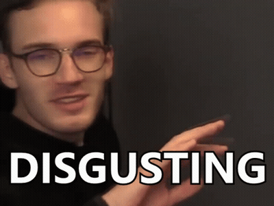 A Man Wearing Glasses Is Making A Funny Face And The Word Disgusting Is Behind Him . GIF