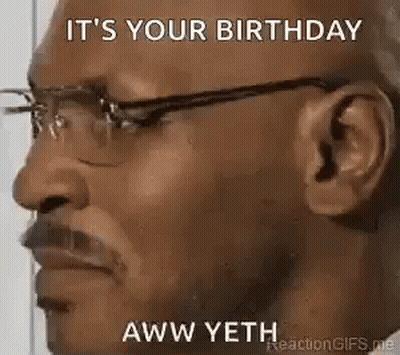 A Man Wearing Glasses Is Making A Funny Face . GIF