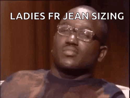 A Man Wearing Glasses Is Making A Funny Face With The Words Ladies Fr Jean Sizing Wack Below Him GIF