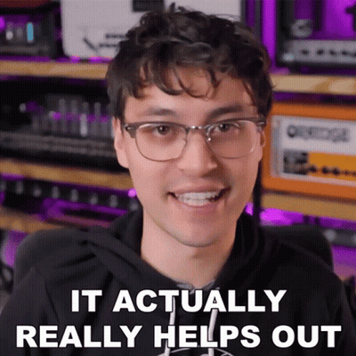 A Man Wearing Glasses Is Smiling And Says It Actually Helps Out GIF