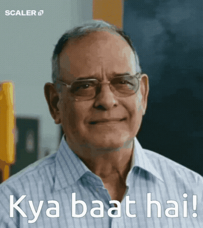 A Man Wearing Glasses Is Smiling With The Words Kya Baat Hai Written Below Him GIF