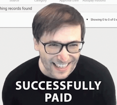 A Man Wearing Glasses Is Smiling With The Words Successfully Paid In Front Of Him GIF