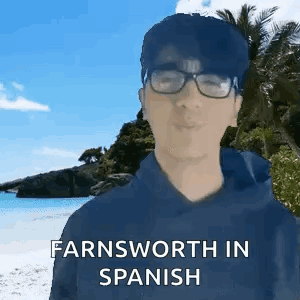 A Man Wearing Glasses Is Standing In Front Of A Beach With The Words Farnsworth In Spanish . GIF