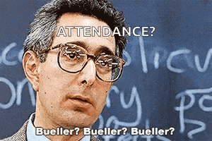 A Man Wearing Glasses Is Standing In Front Of A Chalkboard With The Words Attendance Written On It GIF