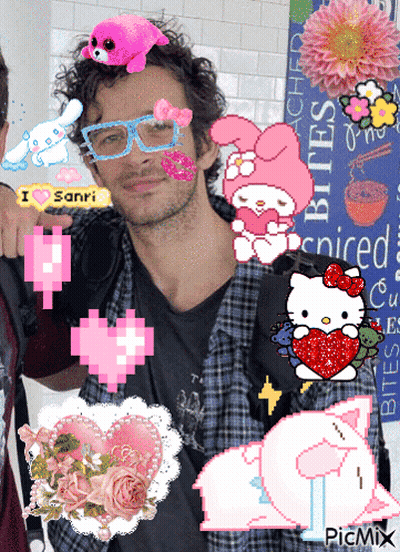 A Man Wearing Glasses Is Surrounded By Pink Hearts And Hello Kitty Stickers GIF