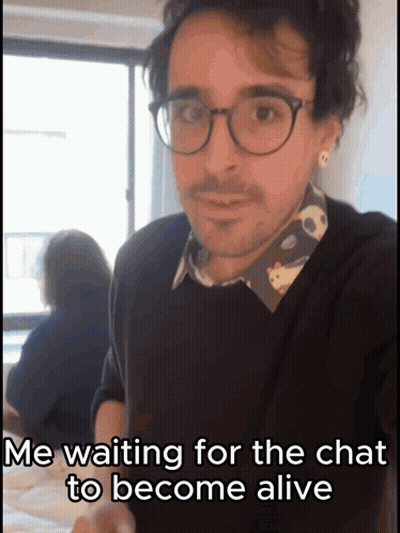 A Man Wearing Glasses Is Waiting For Someone To Become Alive GIF