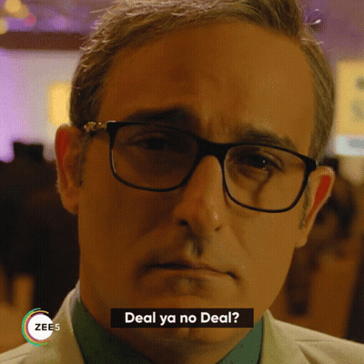 A Man Wearing Glasses Says " Deal Ya No Deal " On The Screen GIF