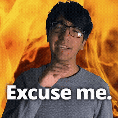 A Man Wearing Glasses Says Excuse Me In Front Of A Flaming Background GIF
