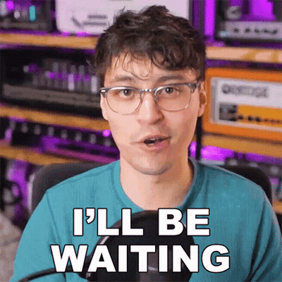 A Man Wearing Glasses Says " I 'Ll Be Waiting " GIF