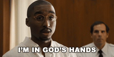 A Man Wearing Glasses Says " I 'M In God 'S Hands " GIF