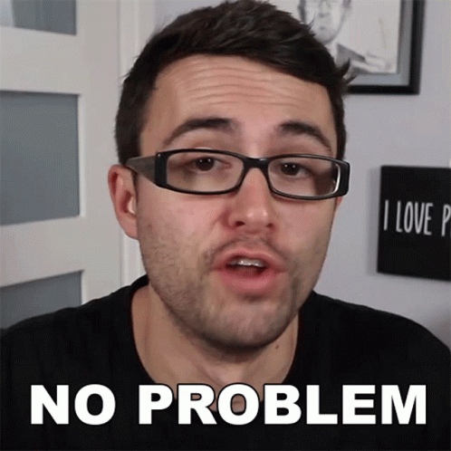 A Man Wearing Glasses Says " No Problem " In Front Of Him GIF