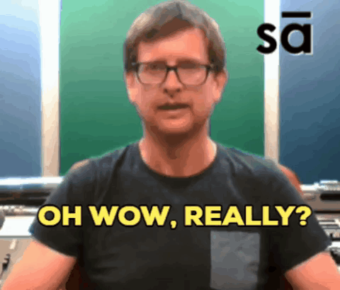 A Man Wearing Glasses Says " Oh Wow Really " GIF
