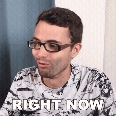 A Man Wearing Glasses Says Right Now GIF