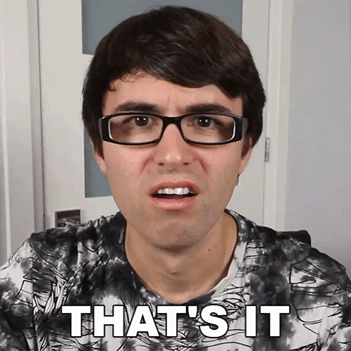 A Man Wearing Glasses Says That 'S It In Front Of A Door GIF