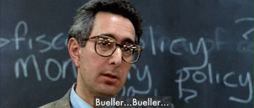 A Man Wearing Glasses Stands In Front Of A Blackboard That Says " Fiscal Policy " GIF