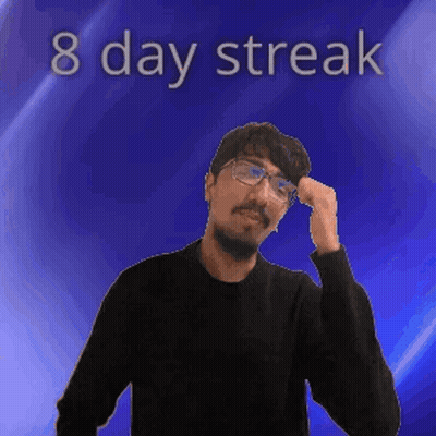 A Man Wearing Glasses Stands In Front Of A Blue Background With The Words 8 Day Streak On It GIF