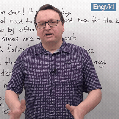 A Man Wearing Glasses Stands In Front Of A Whiteboard That Says " Kay " On It GIF