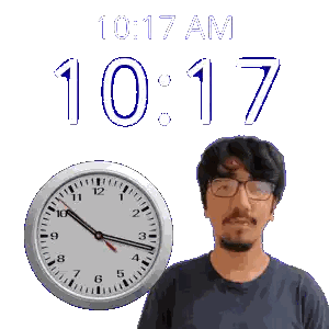 A Man Wearing Glasses Stands Next To A Clock That Says 10:17 Am Sticker