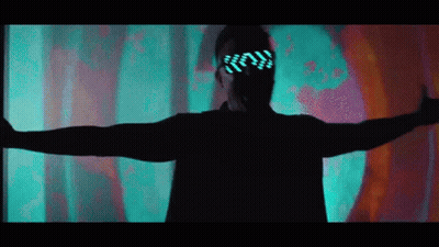 A Man Wearing Glow In The Dark Glasses Is Dancing GIF