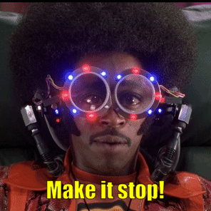 A Man Wearing Goggles That Say Make It Stop On The Bottom GIF