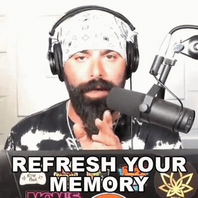 A Man Wearing Headphones And A Bandana Says " Refresh Your Memory " In Front Of A Microphone GIF