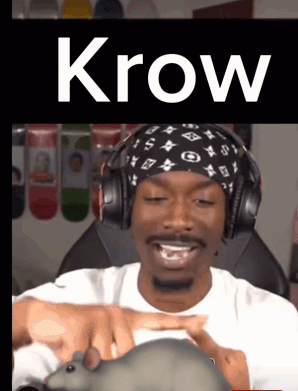 A Man Wearing Headphones And A Bandana With The Word Krow On The Bottom GIF