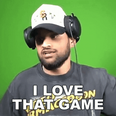 A Man Wearing Headphones And A Baseball Cap Says I Love That Game GIF