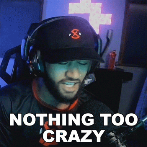 A Man Wearing Headphones And A Black Hat Says " Nothing Too Crazy " GIF