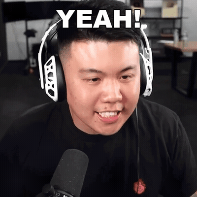 A Man Wearing Headphones And A Black Shirt Says " Yeah " GIF