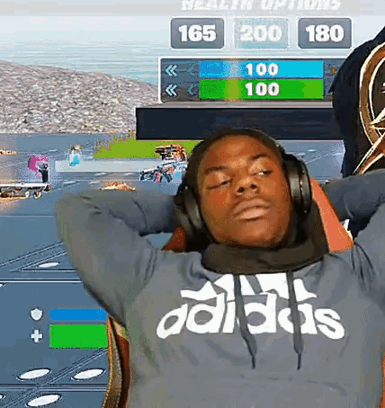 A Man Wearing Headphones And A Blue Adidas Sweatshirt GIF