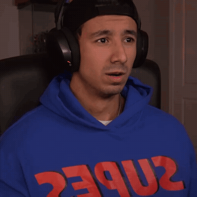 A Man Wearing Headphones And A Blue Hoodie That Says 2Nbec On It GIF