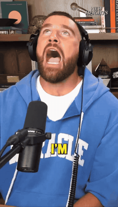 A Man Wearing Headphones And A Blue Shirt That Says I 'M On It GIF