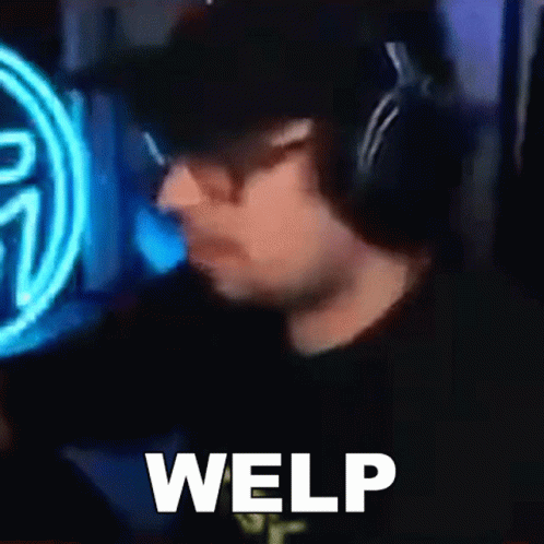 A Man Wearing Headphones And A Hat Is Sitting In Front Of A Computer Screen And Says Welp . GIF