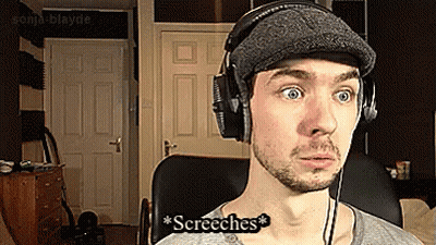 A Man Wearing Headphones And A Hat Says ' Screeches ' GIF