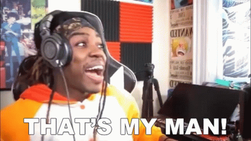 A Man Wearing Headphones And A Hat Says That 'S My Man ! GIF