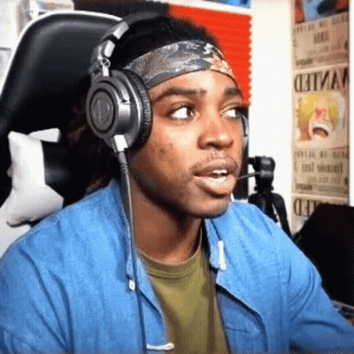 A Man Wearing Headphones And A Headband Has A Wanted Poster Behind Him GIF