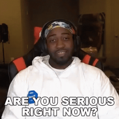 A Man Wearing Headphones And A Headband Is Asking If He Is Serious Right Now GIF