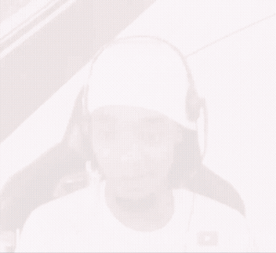 A Man Wearing Headphones And A Headband With The Words Flight 23 White On The Bottom Right GIF